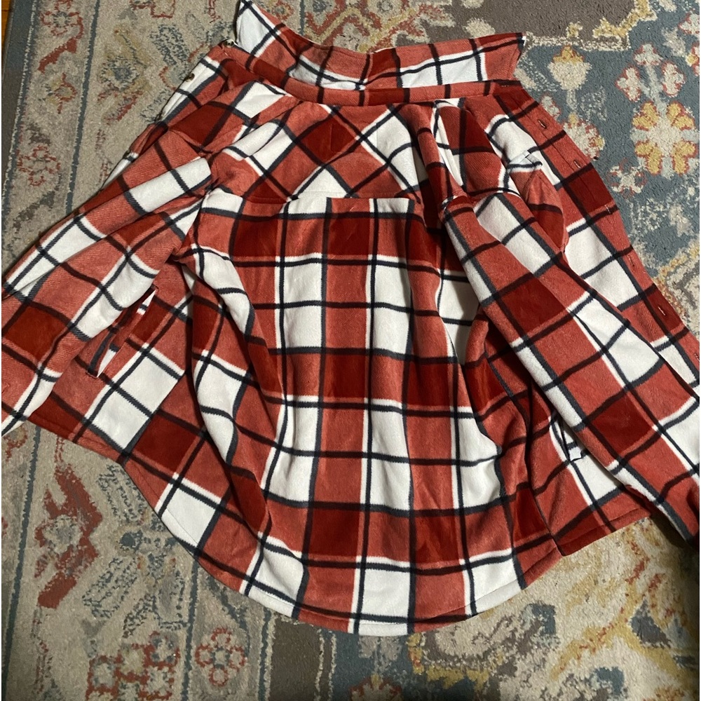 Very thick and nice material flannel fur jacket. Guaranteed to keep you warm.